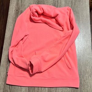 A neon peach turtleneck sweatshirt from Old Navy with front pocket